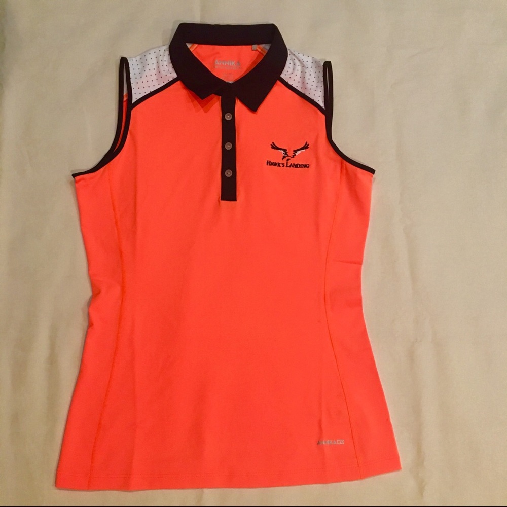 Bright orange woman’s golf shirt sleeveless xs